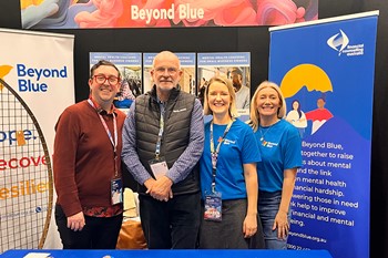 Our team members Norm and Matt with Lucy and Mel from Beyond Blue - Financial Counselling Australia conference - Adelaide - May 2025